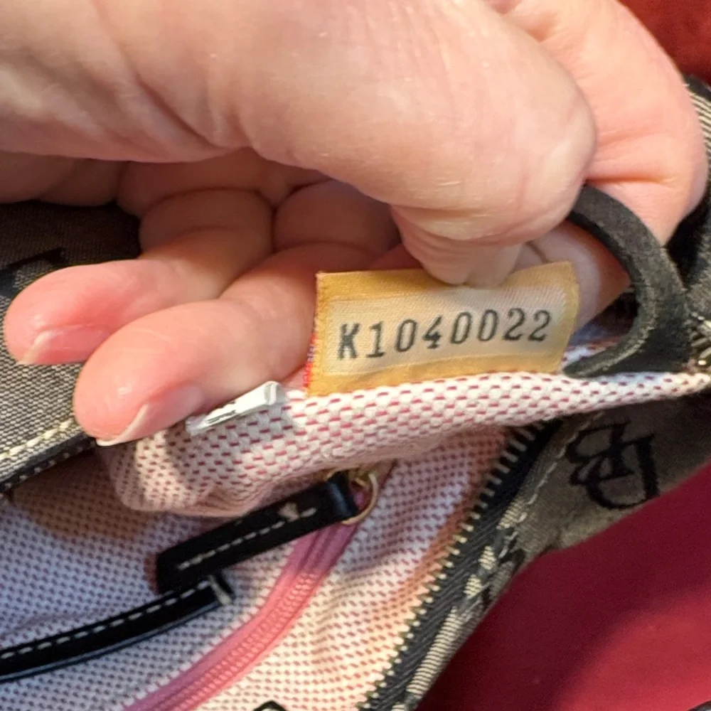 Dooney & Bourke Tan and Black Logo Hobo Bag